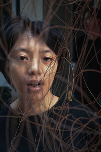 Close-up portrait of a young woman