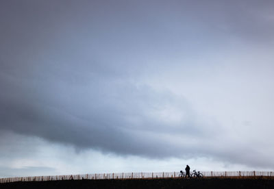 Scenic view of bicycle against sky