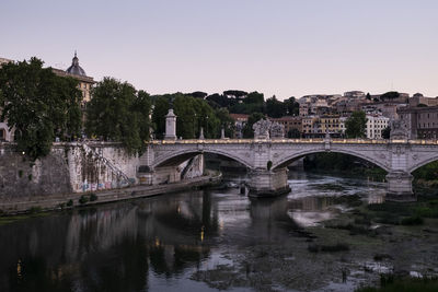 Bridge over river against clear sky