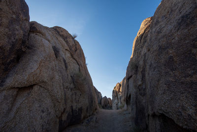 Panoramic view of mountains against clear sky