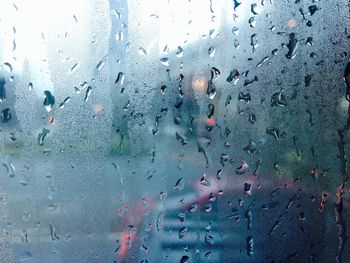 Close-up of water drops on glass