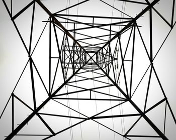 Full frame shot of electricity pylon against clear sky