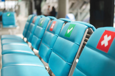 Close-up of empty seats in row