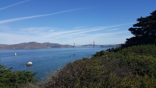 Scenic view of bay against sky