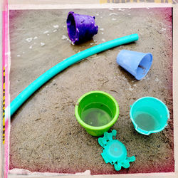 Colorful objects on tiled floor