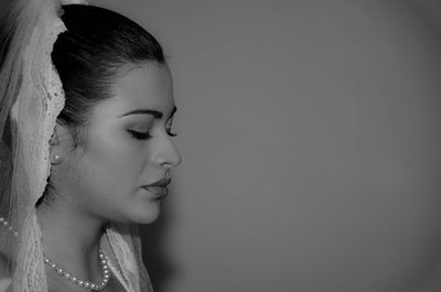 Close-up of young woman looking away