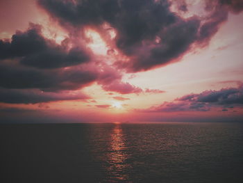 Scenic view of sea against sky at sunset