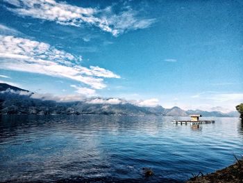 Scenic view of sea against blue sky