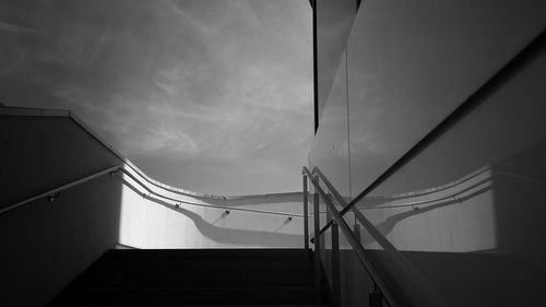 Low angle view of building against cloudy sky