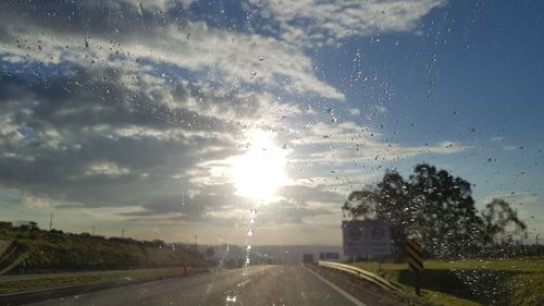 View of road against cloudy sky