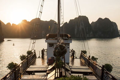 High angle view of boat on ha long bay against clear sky during sunset