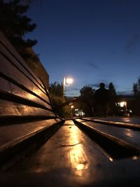 View of illuminated street at night