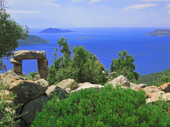 Scenic view of sea against blue sky