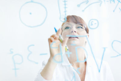 Female scientist working in laboratory