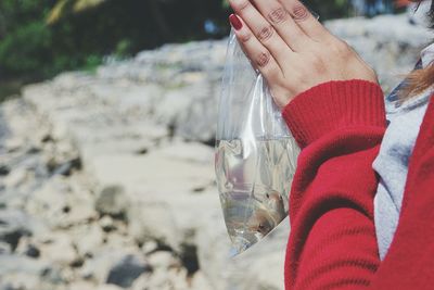 Close-up of hand plastic bag