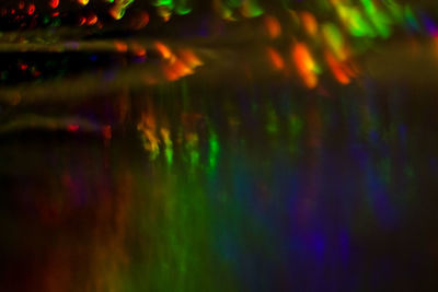 Defocused image of illuminated lights at night