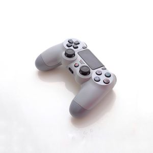 High angle view of telephone on table against white background