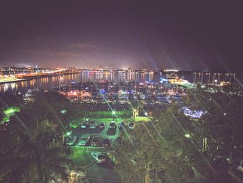 High angle view of illuminated cityscape at night