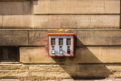 Information sign on brick wall