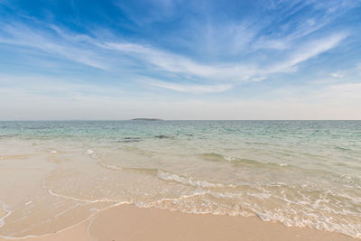 Scenic view of sea against blue sky