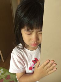 Girl crying at home