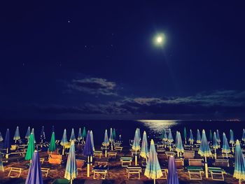 Panoramic view of sea against sky at night