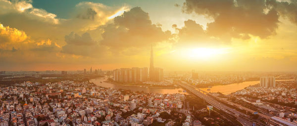 High angle view of city during sunset