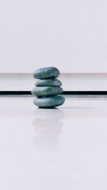 Stack of stones on table