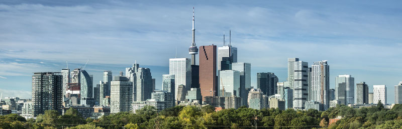 Skyscrapers in city against sky