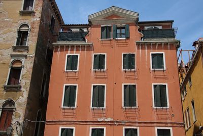 Low angle view of residential building against sky