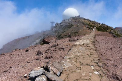 Scenic view of rocky mountains against sky
