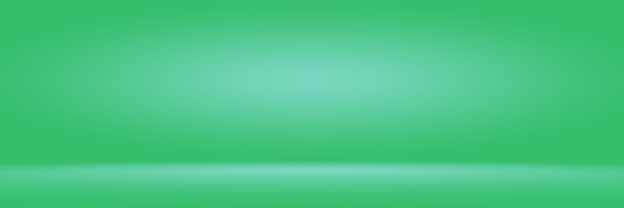 ABSTRACT IMAGE OF GREEN LIGHTS ON BLUE BACKGROUND