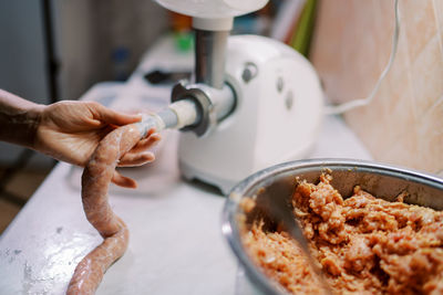 Midsection of man working in workshop