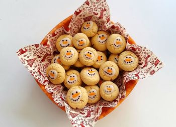 Close-up of candies against white background