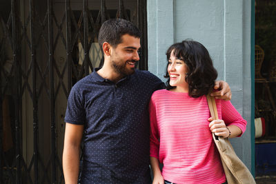 Young couple standing outdoors