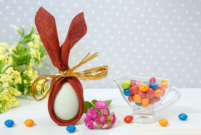 Close-up of multi colored candies on table