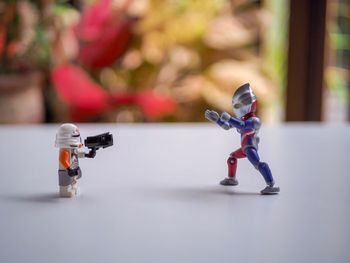 Close-up of robots on table