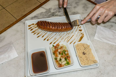 High angle view of woman preparing food