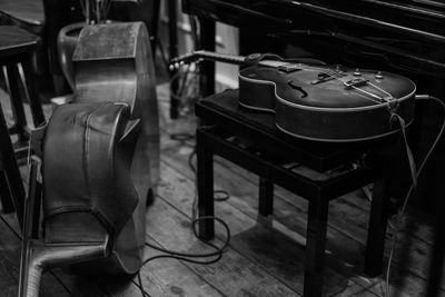 Close-up of guitars on table