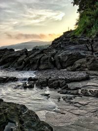 Scenic view of sea against sky at sunset