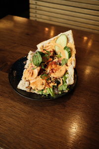 High angle view of kebab food in plate on table