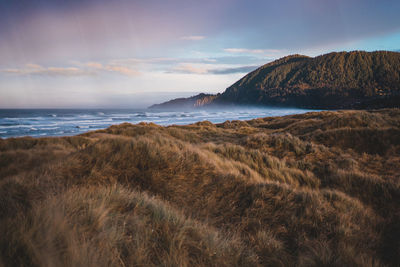 Scenic view of sea against sky during sunset