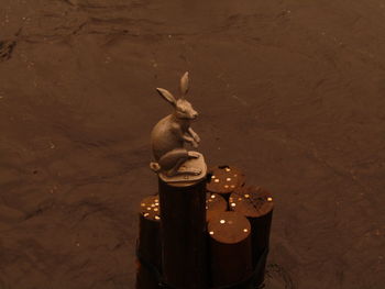 High angle view of statue against wall