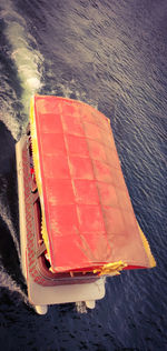 High angle view of red boat on beach