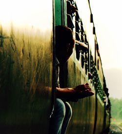 Close-up of man in train