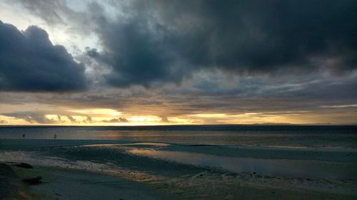 Scenic view of dramatic sky over sea