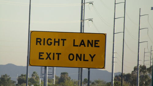 Sign board on road