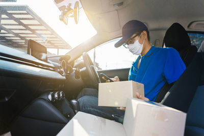 Woman sitting in car