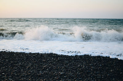 Scenic view of sea against clear sky