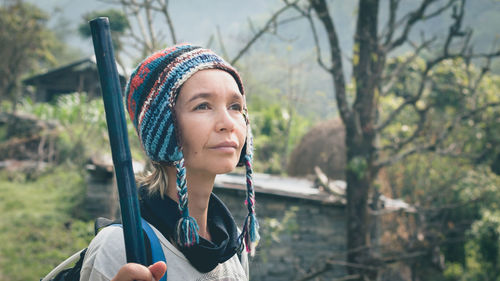 Thoughtful hiker in forest